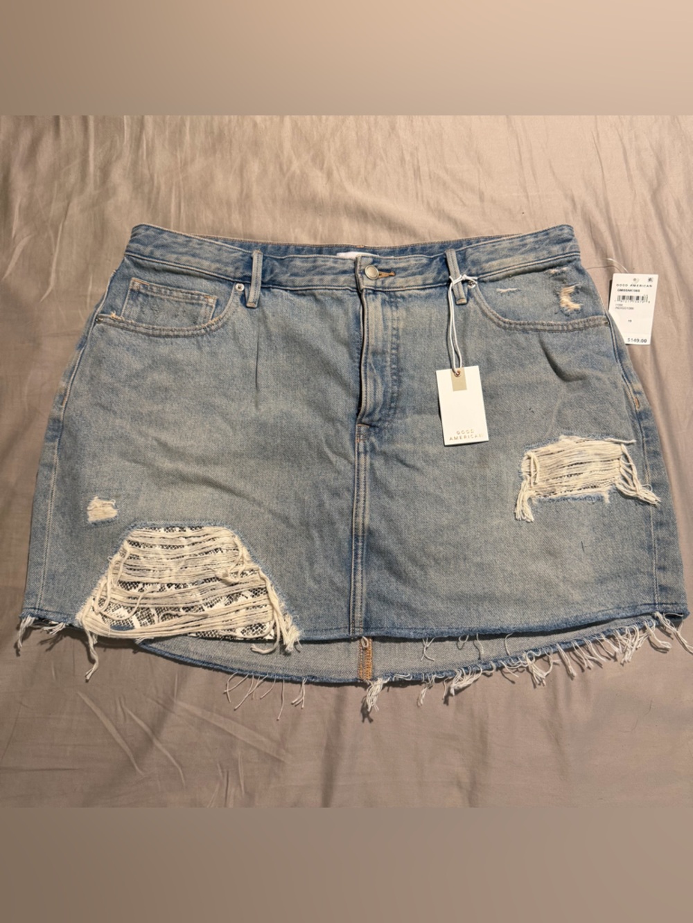Good American “The Khloé Mini Skirt” Light Blue Distressed Denim Skirt with Tags